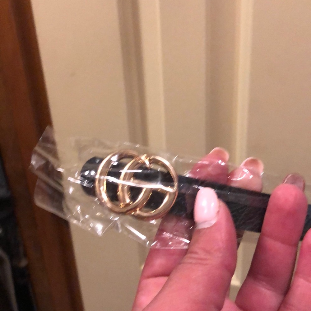 NEW in packaging black CG skinny belt